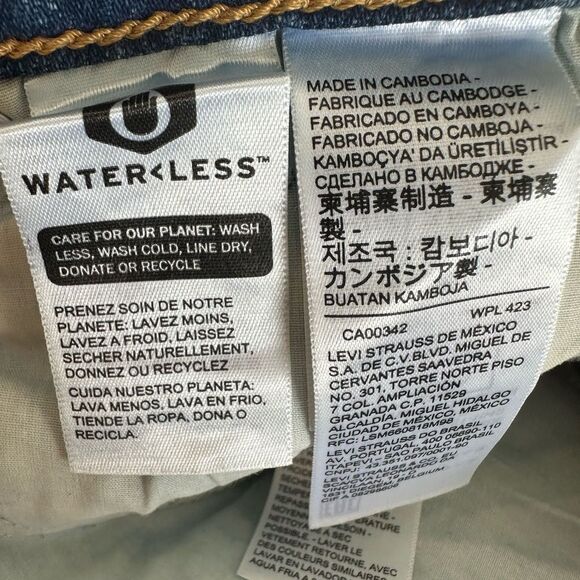 Levi's 70s Inspired High Rise Slim Fit Medium Wash Raw Edge Flare Denim Jeans 28 - Picture 12 of 13